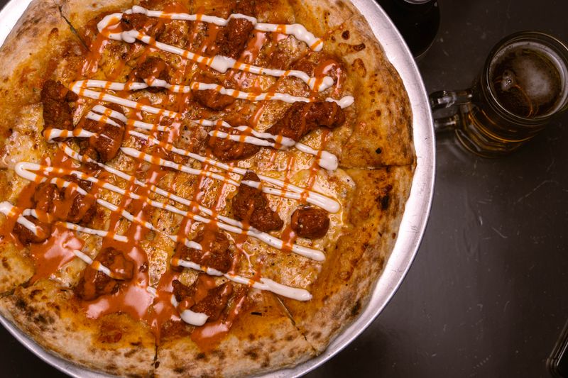 BBQ Chicken Ranch pizza with smoky chicken and ranch drizzle