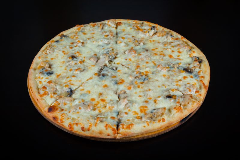 Truffle Mushroom pizza with earthy truffle oil and wild mushrooms